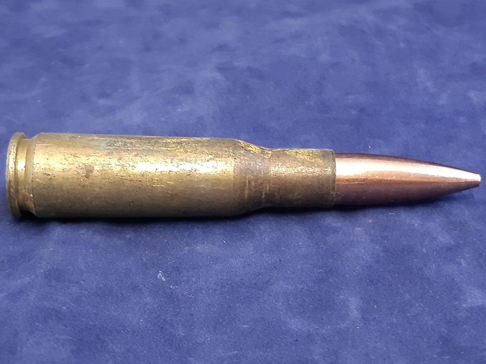 Inert/ display - .50 Cal. x 77 Spotting Rifle round, brass case, copper fmj  bullet. As used on now obsolete 105mm/120mm Recoilless anti-tank (BAT)  artillery weapons - Antique Armoury